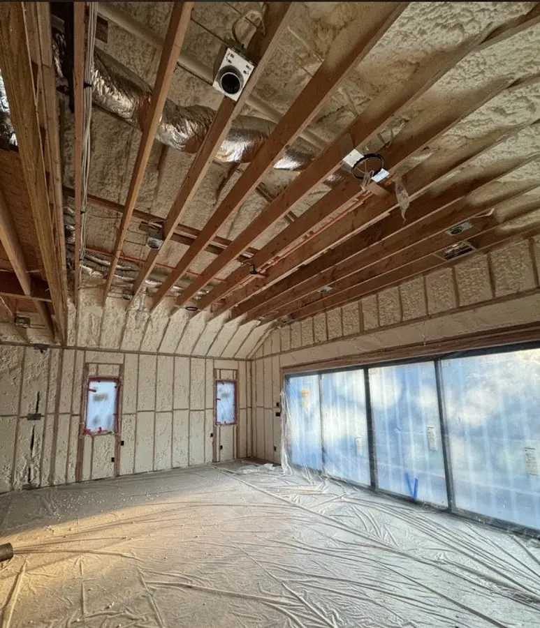 Interior walls and ceiling insulated with spray foam during new construction in Immokalee